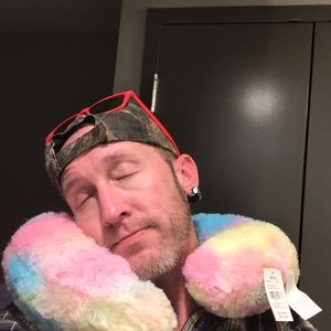 don’t even know what this is-Unicorn neck pillow?